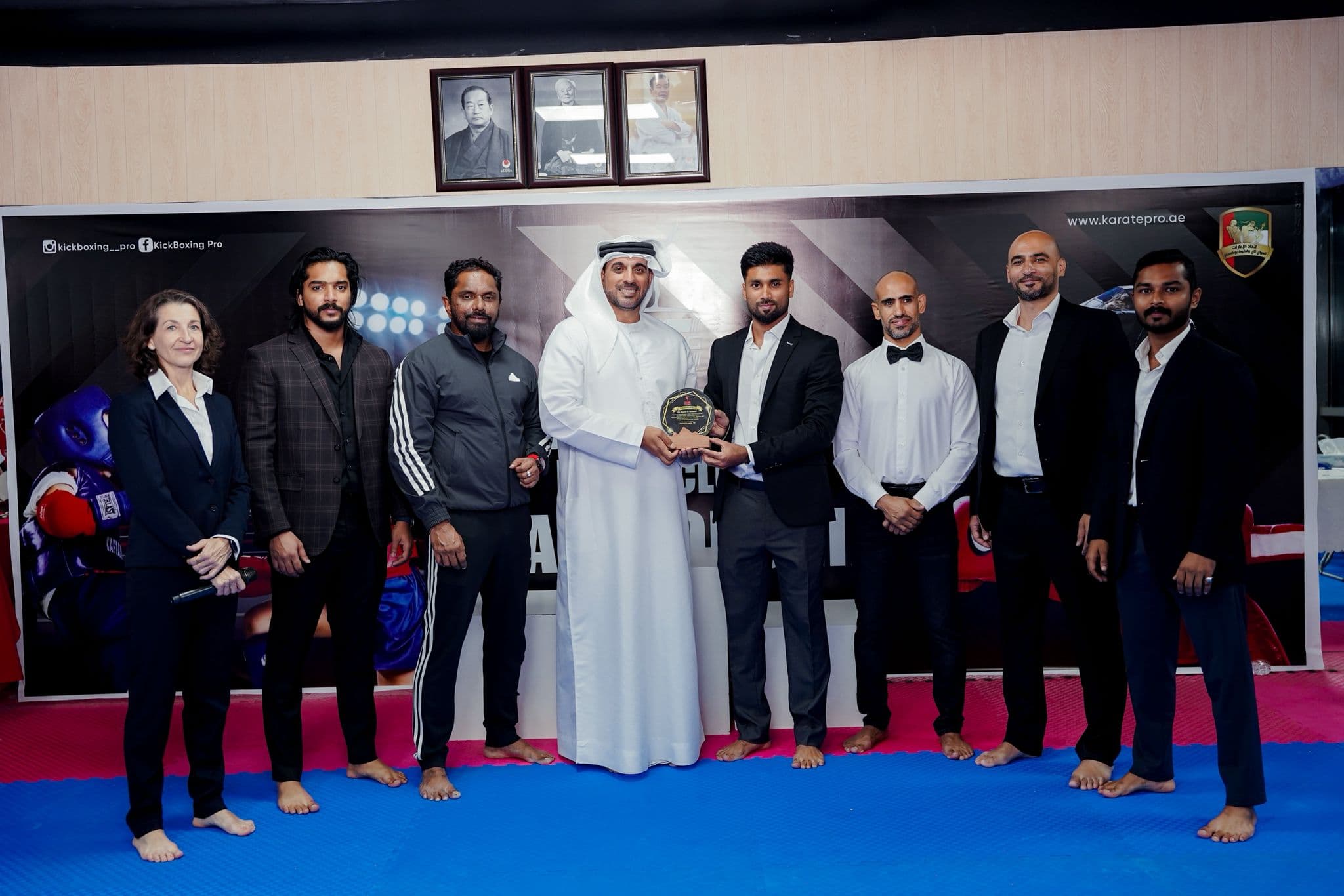 Guest of honour receiving a plaque from organisers at the Kickboxing pro inter club championship 2025