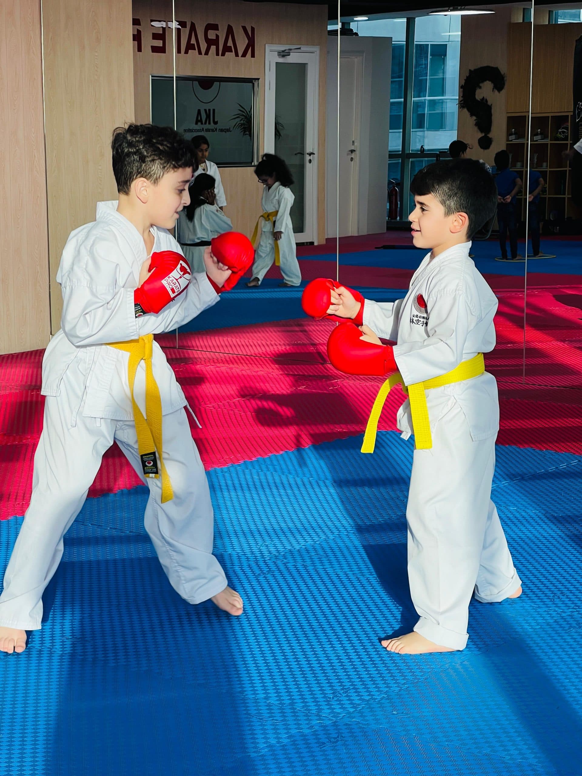 Kids sparring during a 2024 kumite grading exam